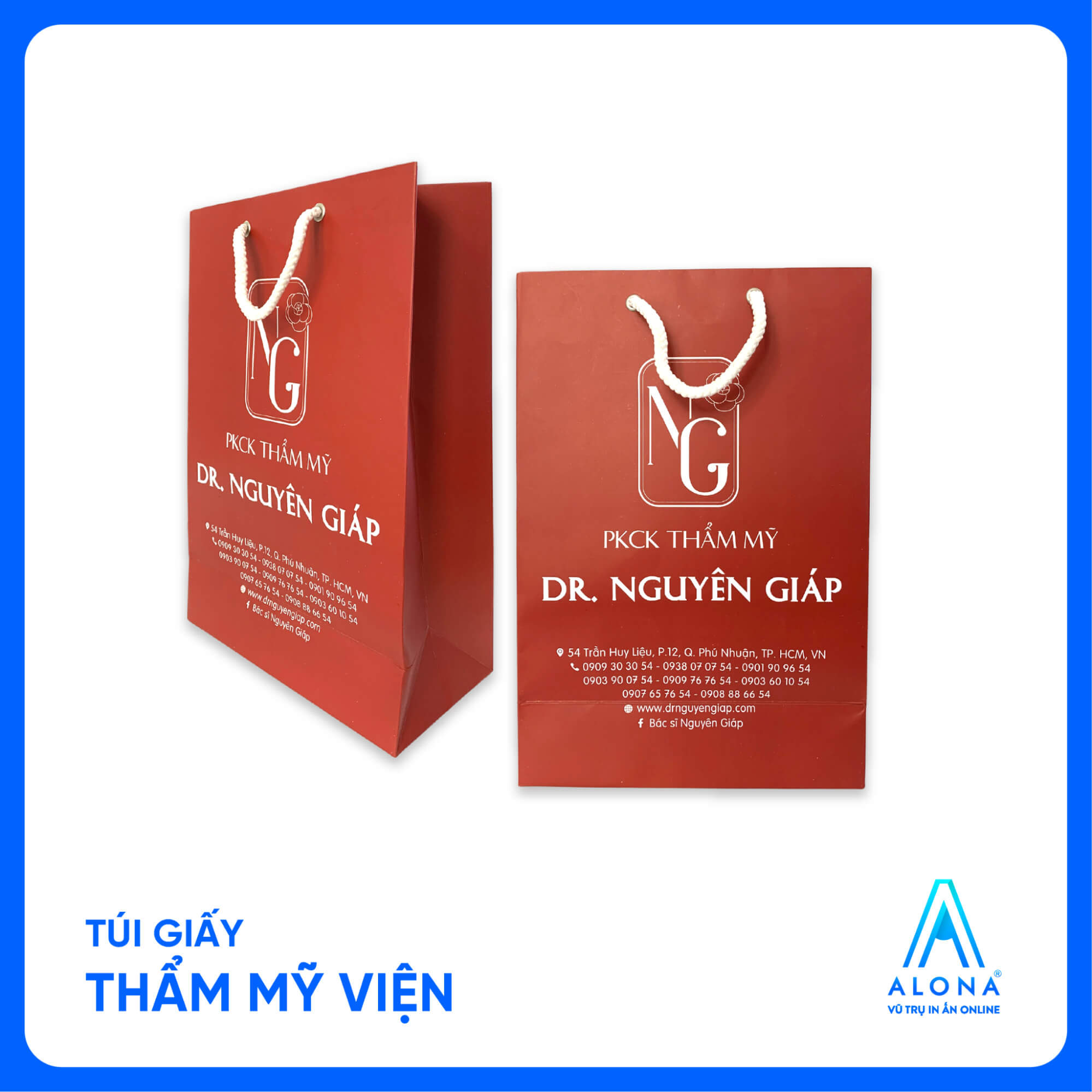 Túi giấy đứng tông đỏ, quai dây dù trắng nổi bật, chuyên nghiệp